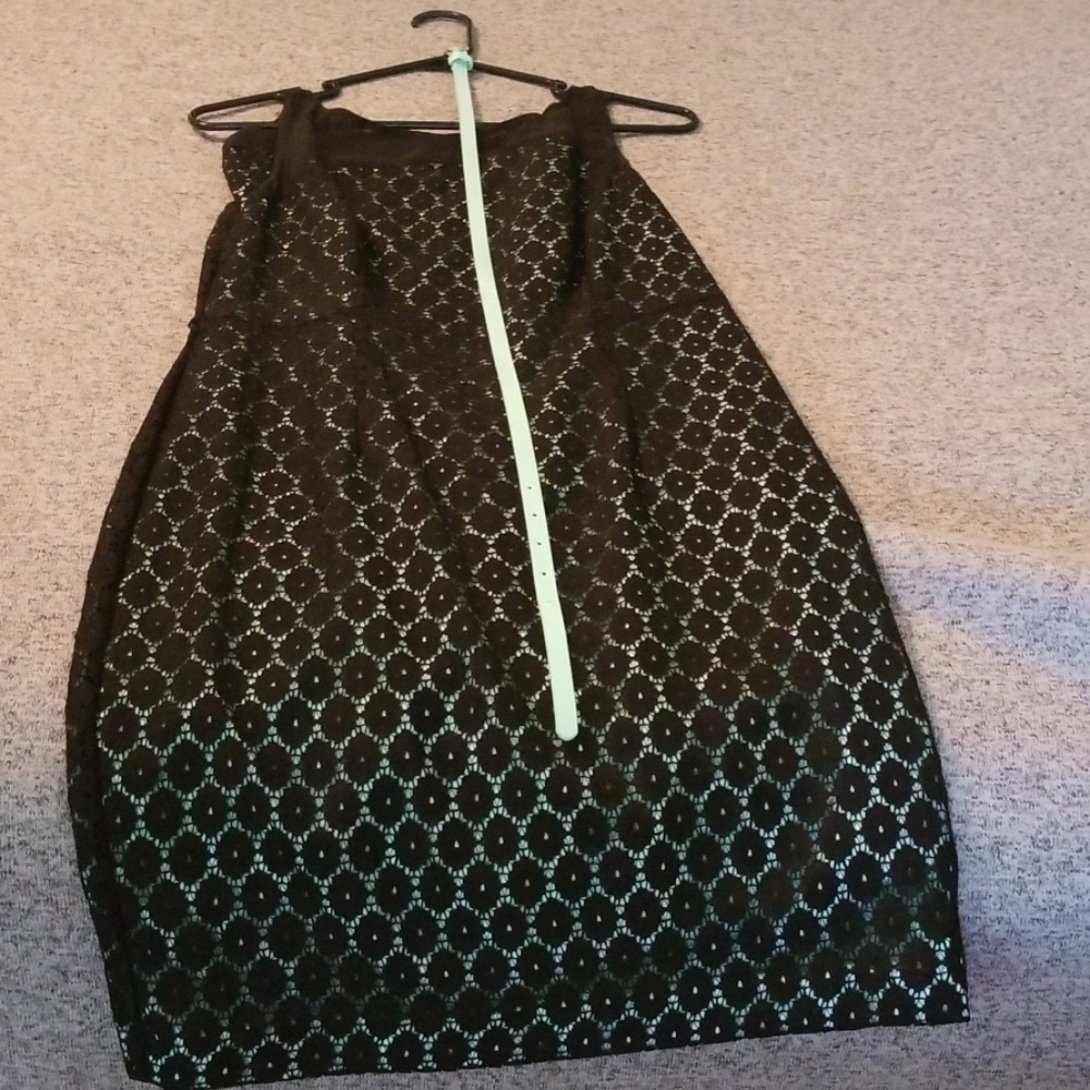Knee length black lace and mint dress